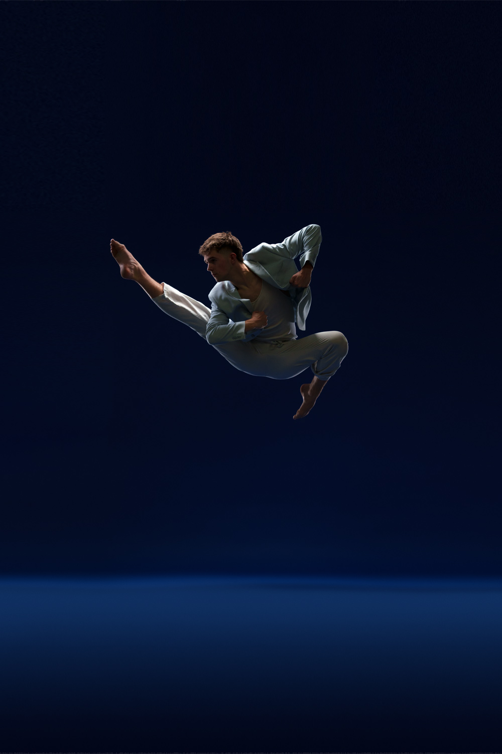 Male dancer photographed in motion by DFW Dance Photography
