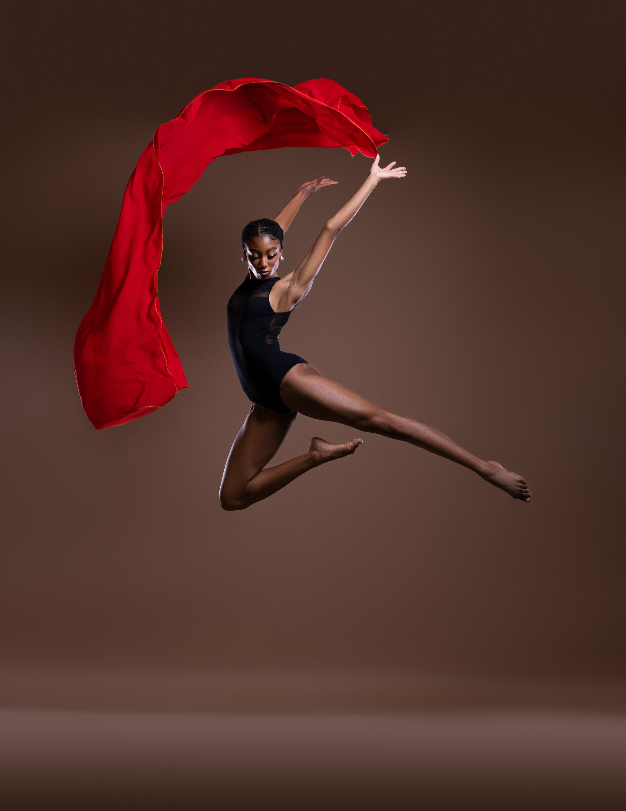 Creative movement portrait in red by DFW Dance Photography