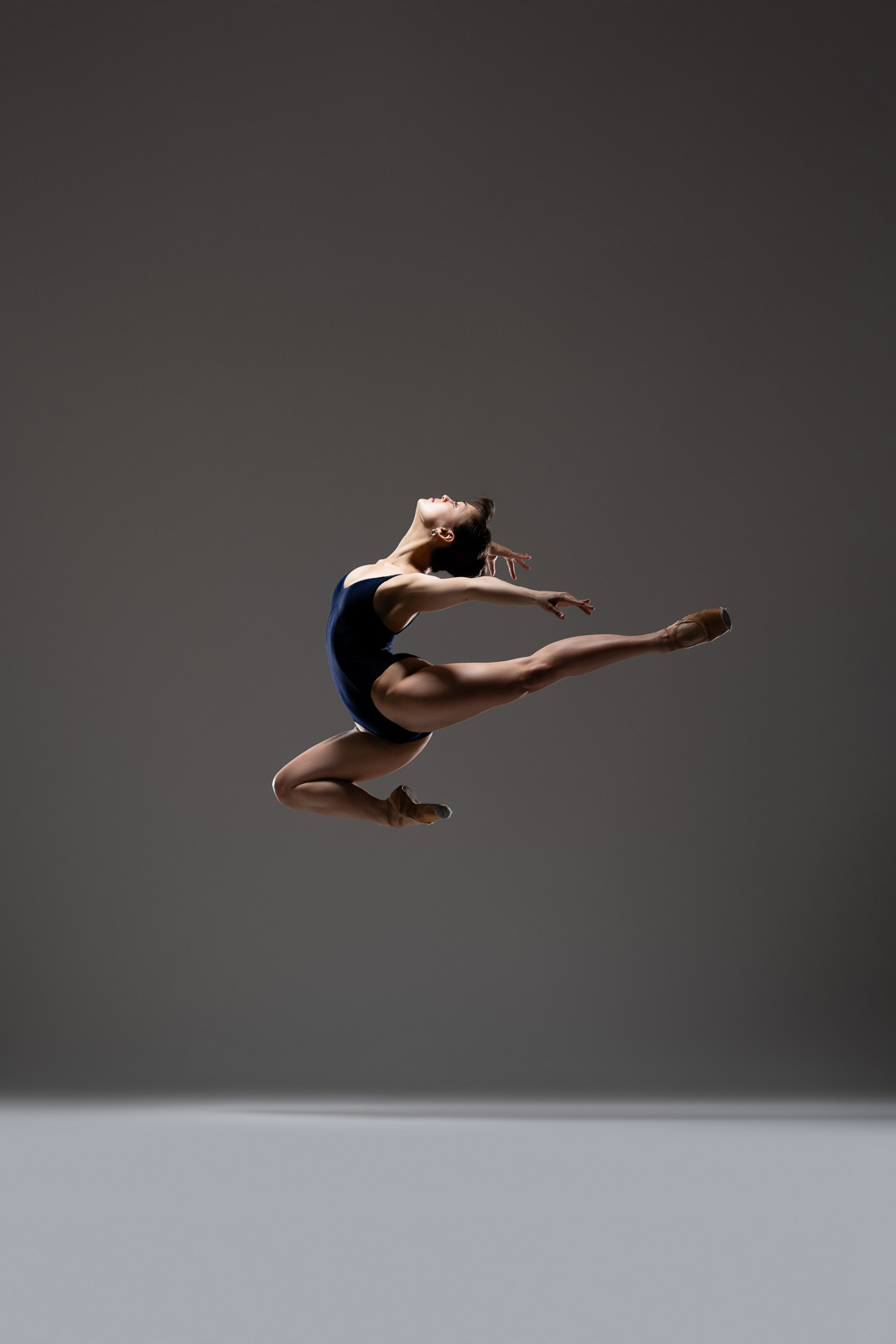 Ballet dancer photographed in motion by DFW Dance Photography