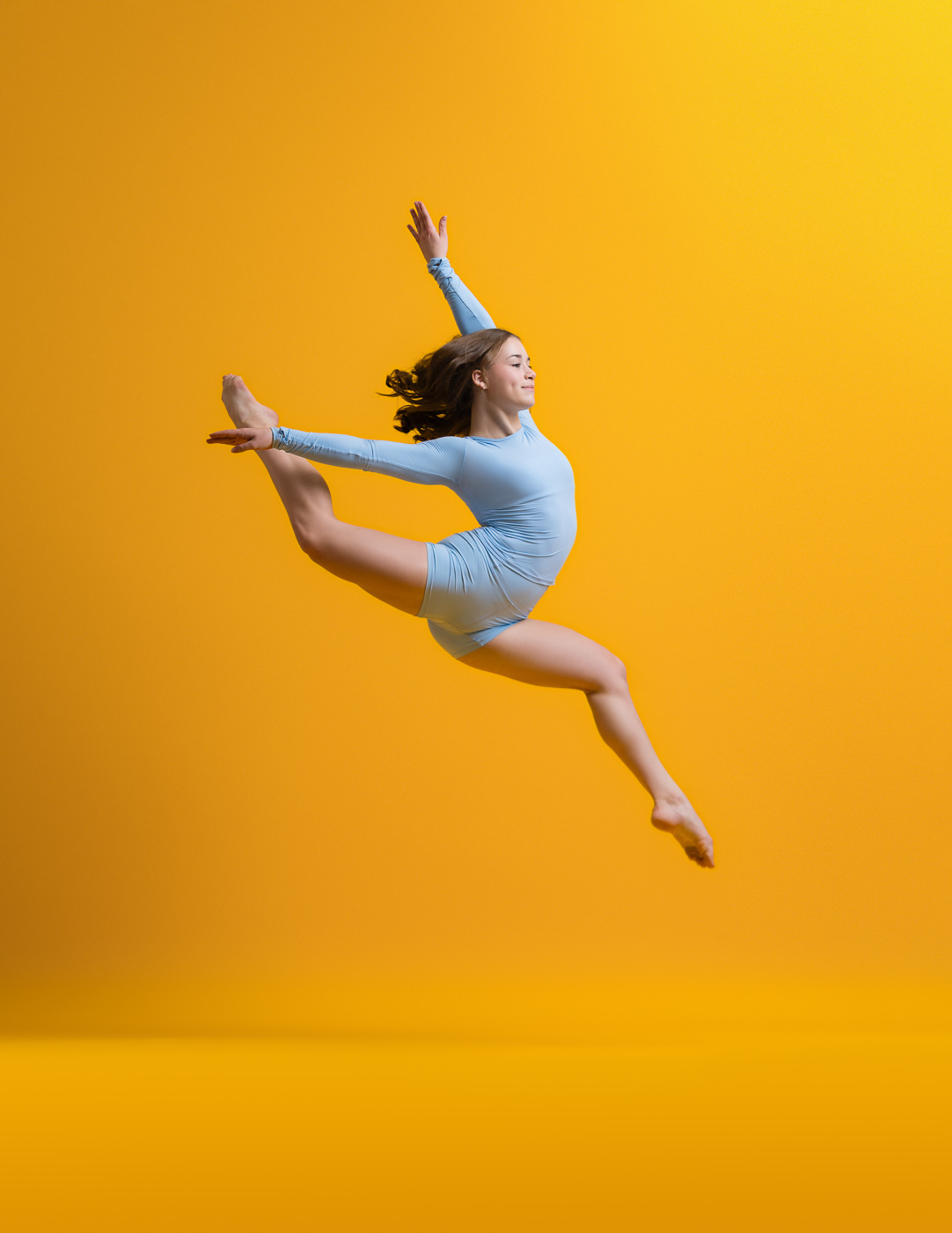 Athletic dance leap photographed by DFW Dance Photography